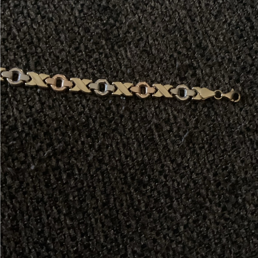 14k yellow,white and rose gold braclet.